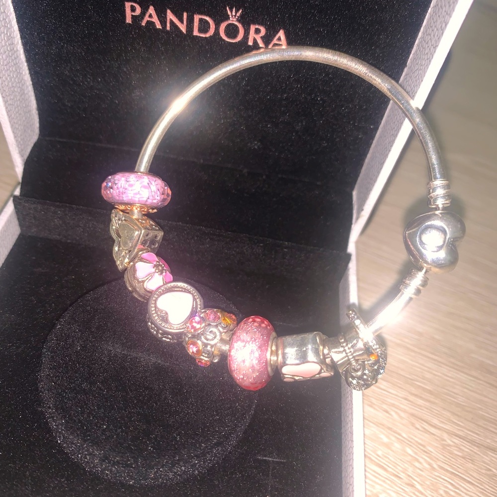 Child’s pandora bracelet with charms and box. Only worn a few times.